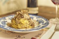 Tagliolini con tartufo nero e crema di Parmigiano Reggiano